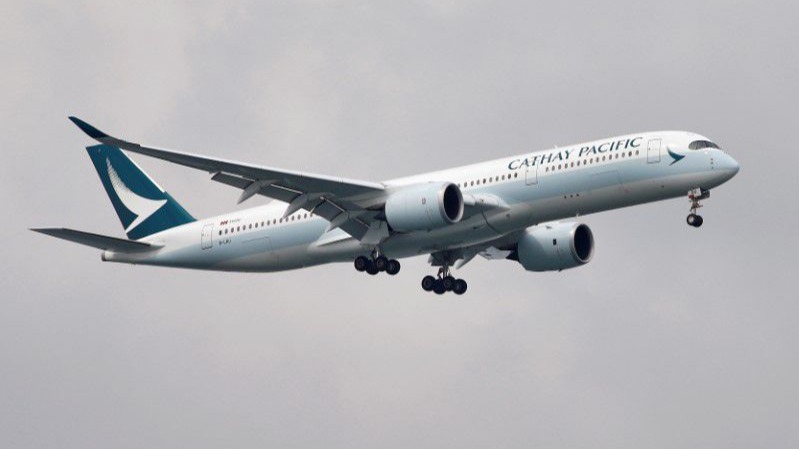 Cathay Pacific's annual loss shrinks to just $720 million.